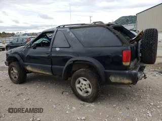 2000 Chevrolet Blazer LS z VIN 1GNCT18W9YK277871, wystawiony jako Copart lot #46158185 z przebiegiem Nie podano mil oraz Nie do naprawy • Non repairable. Historia ofert i sprzedaży dostępna na DreamBid. Obrazek 2.