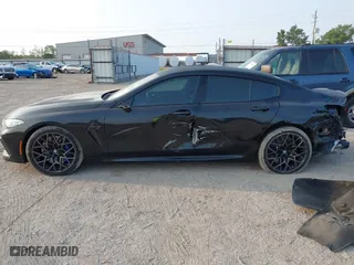 2020 BMW M8 with VIN WBSGV0C06LCD99264, listed as a IAAI auction lot 40276722 with 38,039 mi miles. Bid and sale history available at carsss.com. Image 15.