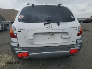 2002 Hyundai Santa Fe GLS with VIN KM8SC73D02U311622, listed as a Copart auction lot 71742874 with 99,807 mi miles and Salvage Title. Bid and sale history available at carsss.com. Image 6.