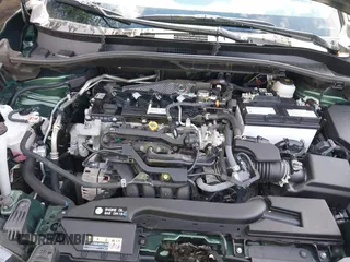 2023 Toyota Corolla Cross XLE z VIN 7MUDAABG1PV075110, wystawiony jako IAAI lot #42802303 z przebiegiem 41 869 mil mil oraz . Historia ofert i sprzedaży dostępna na DreamBid. Obrazek 10.