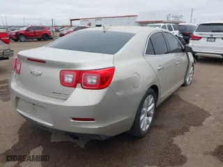 2015 Chevrolet Malibu LTZ with VIN 1G11F5SL3FF328986, listed as a IAAI auction lot 41578501 with 147,998 mi miles. Bid and sale history available at carsss.com. Image 4.