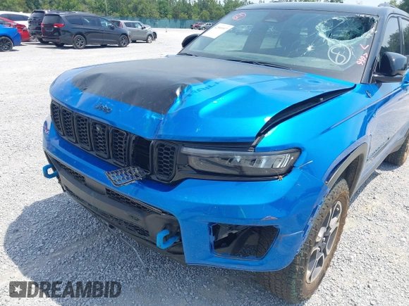 2022 Jeep Grand Cherokee Trailhawk with VIN 1C4RJYC68N8759961, listed as a IAAI auction lot 42589997 with 28,429 mi miles and . Bid and sale history available at DreamBid. Image 12.