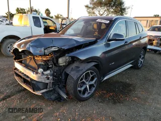 2017 BMW X1 xDrive28i with VIN WBXHT3C30H5F71865, listed as a Copart auction lot 67841122 with 75,471 mi miles. Bid and sale history available at carsss.com. Image 1.