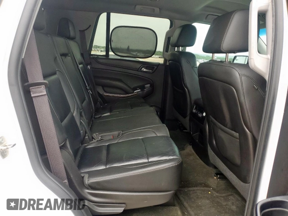 2015 Chevrolet Tahoe LT with VIN 1GNSCBKC0FR210211, listed as a Copart auction lot 55496995 with 128,296 mi miles and Salvage title. Bid and sale history available at DreamBid. Image 10.
