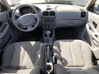 2005 Hyundai Accent GLS with VIN KMHCG45C65U625887, listed as a Copart auction lot 48824225 with 110,594 mi miles and Salvage Title. Bid and sale history available at carsss.com. Image 8.