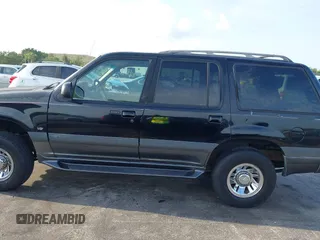 1999 Mercury Mountaineer z VIN 4M2ZU52P9XUJ11372, wystawiony jako IAAI lot #41849011 z przebiegiem 286 379 mil mil oraz . Historia ofert i sprzedaży dostępna na DreamBid. Obrazek 14.