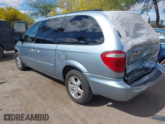 2005 Dodge Caravan SXT with VIN 2D4GP44L75R193138, listed as a IAAI auction lot 42073429 with 206,915 mi miles and . Bid and sale history available at DreamBid. Image 3.