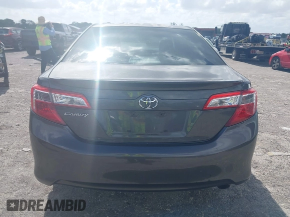 2012 Toyota Camry L with VIN 4T1BF1FK1CU165165, listed as a IAAI auction lot 41957566 with 127,048 mi miles. Bid and sale history available at carsss.com. Image 16.