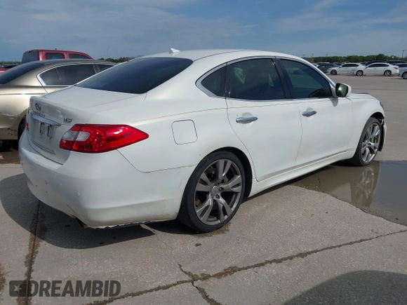 2013 Infiniti M with VIN JN1BY1AP4DM511067, listed as a IAAI auction lot 41890196 with 316,837 mi miles and . Bid and sale history available at DreamBid. Image 4.