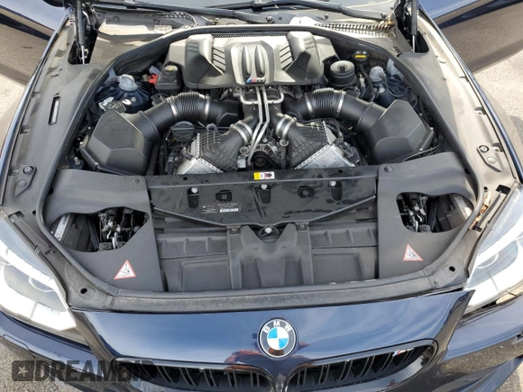 2015 BMW M6 with VIN WBSLZ9C59FD651474, listed as a Copart auction lot 60882454 with Not provided miles and Salvage title. Bid and sale history available at DreamBid. Image 11.