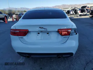2019 Jaguar XE 25t with VIN SAJAR4FX2KCP48452, listed as a Copart auction lot 77409984 with 62,204 mi miles and Salvage Title. Bid and sale history available at carsss.com. Image 6.