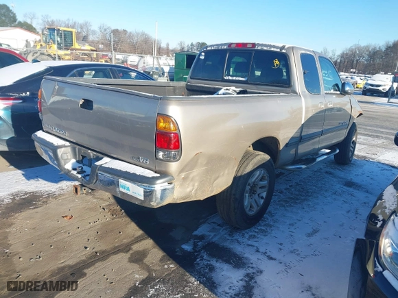 2002 Toyota Tundra SR5 with VIN 5TBRT34142S246044, listed as a IAAI auction lot 41355453 with 285,809 mi miles. Bid and sale history available at carsss.com. Image 4.