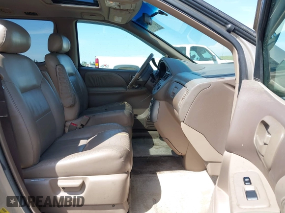 2002 Toyota Sienna LE with VIN 4T3ZF13C32U486822, listed as a IAAI auction lot 42019920 with 212,606 mi miles. Bid and sale history available at carsss.com. Image 5.