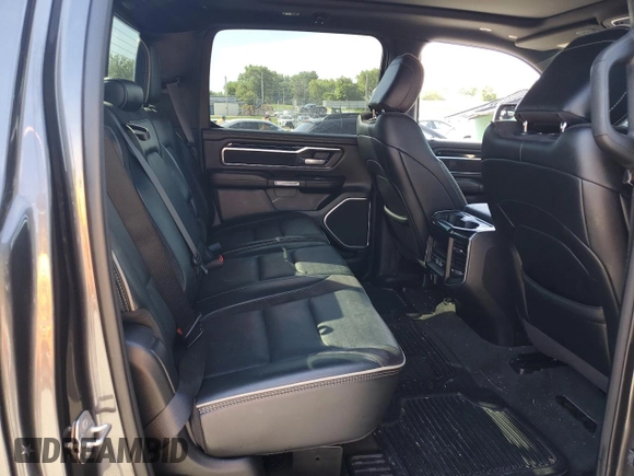 2021 Ram 1500 Laramie with VIN 1C6SRFJT3MN677537, listed as a Copart auction lot 57936295 with Not provided miles and Salvage title. Bid and sale history available at DreamBid. Image 10.