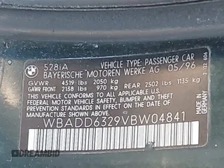 1997 BMW 5 Series 528iA with VIN WBADD6329VBW04841, listed as a IAAI auction lot 42038507 with 147,762 mi miles. Bid and sale history available at carsss.com. Image 9.
