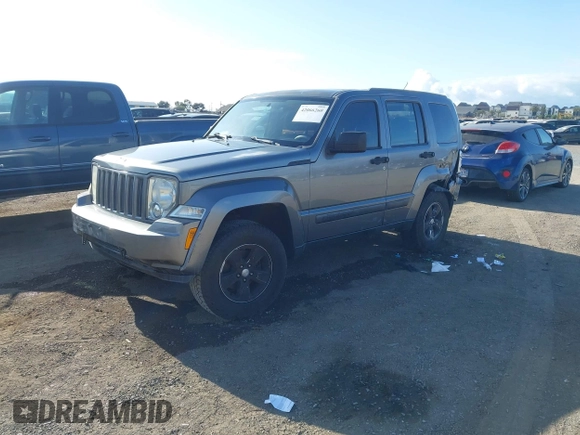 2012 Jeep Liberty Sport with VIN 1C4PJLAK2CW190883, listed as a IAAI auction lot 42066260 with 180,715 mi miles and . Bid and sale history available at carsss.com. Image 2.