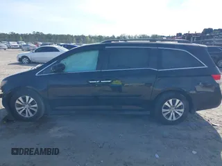 2015 Honda Odyssey EX-L with VIN 5FNRL5H65FB088106, listed as a IAAI auction lot 41880915 with 176,539 mi miles and . Bid and sale history available at carsss.com. Image 14.