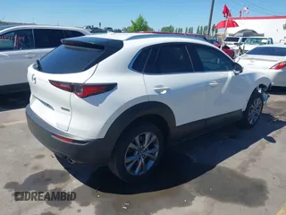 2024 Mazda CX-30 S Premium with VIN 3MVDMBDM8RM633580, listed as a IAAI auction lot 42152915 with 18,679 mi miles and . Bid and sale history available at DreamBid. Image 4.