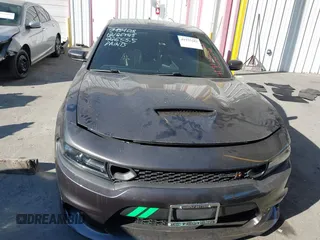 2019 Dodge Charger Scat Pack with VIN 2C3CDXGJ2KH564051, listed as a IAAI auction lot 41255283 with 64,687 mi miles and . Bid and sale history available at DreamBid. Image 12.