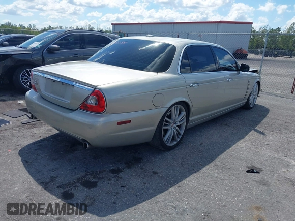 2009 Jaguar XJ with VIN SAJWA94C49TH30042, listed as a IAAI auction lot 41898085 with 145,832 mi miles and . Bid and sale history available at DreamBid. Image 4.