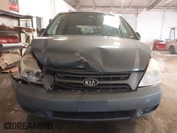 2009 Kia Sedona LX with VIN KNDMB233X96276905, listed as a IAAI auction lot 41394768 with 231,156 mi miles. Bid and sale history available at carsss.com. Image 13.