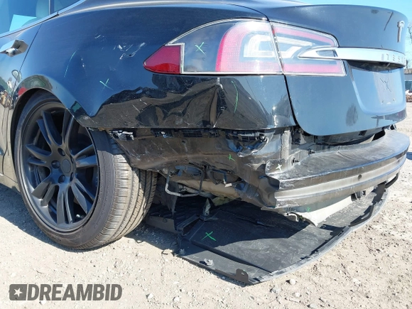 2020 Tesla Model S Long Range with VIN 5YJSA1E23LF381872, listed as a IAAI auction lot 41763046 with 96,720 mi miles and . Bid and sale history available at DreamBid. Image 6.