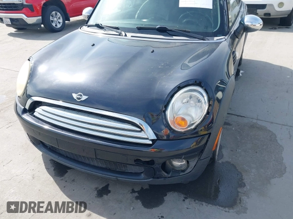 2009 MINI Cooper Hardtop with VIN WMWMF33589TW70400, listed as a IAAI auction lot 42055596 with 118,543 mi miles. Bid and sale history available at carsss.com. Image 6.