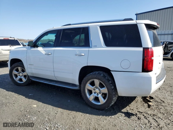 2015 Chevrolet Tahoe LTZ with VIN 1GNSKCKC9FR666040, listed as a Copart auction lot 44431875 with 233,166 mi miles and Salvage Title. Bid and sale history available at carsss.com. Image 2.