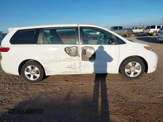 2017 Toyota Sienna L with VIN 5TDZZ3DC3HS828040, listed as a IAAI auction lot 41824384 with 76,159 mi miles. Bid and sale history available at carsss.com. Image 14.
