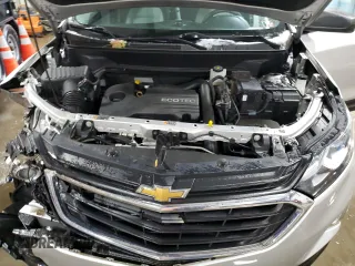 2020 Chevrolet Equinox LS z VIN 3GNAXSEV3LS548773, wystawiony jako Copart lot #87158264 z przebiegiem 41 708 mil mil oraz Szkoda całkowita • Salvage title. Historia ofert i sprzedaży dostępna na DreamBid. Obrazek 11.