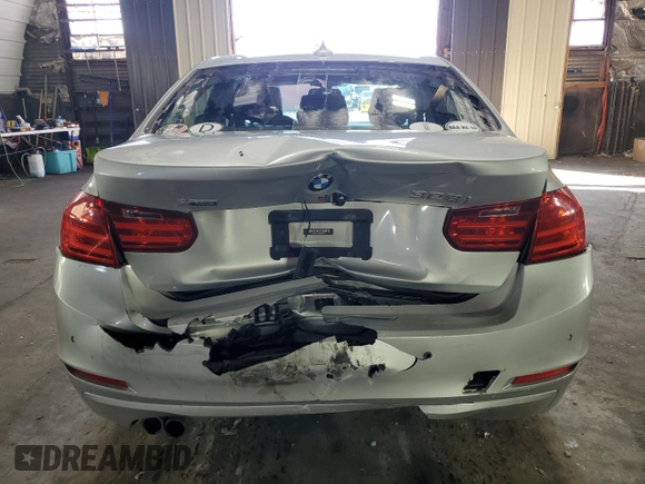 2014 BMW 3 Series 328i xDrive z VIN WBA3B5C55EP652751, wystawiony jako Copart lot #61654285 z przebiegiem 134 642 mil mil oraz Szkoda całkowita • Salvage title. Historia ofert i sprzedaży dostępna na DreamBid. Obrazek 6.