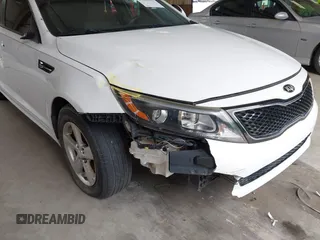 2015 Kia Optima LX z VIN 5XXGM4A72FG488753, wystawiony jako IAAI lot #39163213 z przebiegiem 128 821 mil mil oraz . Historia ofert i sprzedaży dostępna na DreamBid. Obrazek 12.