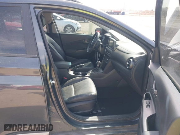 2021 Hyundai Kona Ultimate with VIN KM8K53A50MU601084, listed as a IAAI auction lot 41900099 with 56,171 mi miles. Bid and sale history available at carsss.com. Image 5.