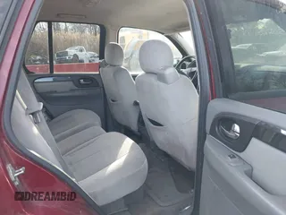 2008 GMC Envoy SLE2 with VIN 1GKDT13S682120370, listed as a IAAI auction lot 41653263 with 214,739 mi miles. Bid and sale history available at carsss.com. Image 8.
