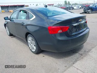 2014 Chevrolet Impala LS with VIN 1G11X5SL0EU164667, listed as a IAAI auction lot 42542110 with 150,458 mi miles and . Bid and sale history available at DreamBid. Image 3.