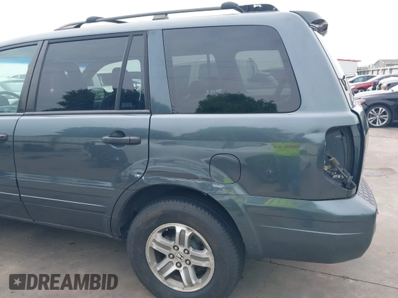2005 Honda Pilot EX-L with VIN 5FNYF18565B046464, listed as a IAAI auction lot 41879495 with 228,021 mi miles. Bid and sale history available at carsss.com. Image 18.