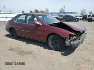 2000 Nissan Altima XE with VIN 1N4DL01D8YC211263, listed as a Copart auction lot 52882685 with Not Provided miles and Salvage Title. Bid and sale history available at DreamBid. Image 4.