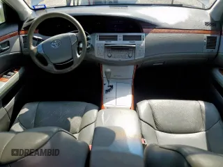 2006 Toyota Avalon XL z VIN 4T1BK36B56U137851, wystawiony jako Copart lot #59928655 z przebiegiem 170 112 mil mil oraz Szkoda całkowita • Salvage title. Historia ofert i sprzedaży dostępna na DreamBid. Obrazek 8.