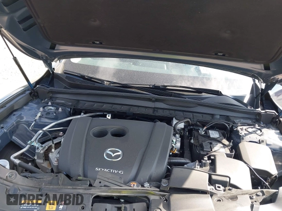2024 Mazda CX-50 S Select with VIN 7MMVABAM5RN208388, listed as a IAAI auction lot 41301055 with 9,815 mi miles and . Bid and sale history available at DreamBid. Image 10.
