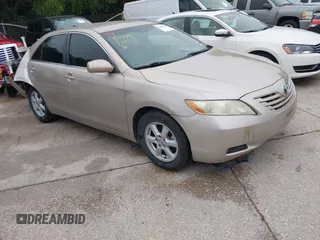 2007 Toyota Camry CE z VIN 4T4BE46K17R001852, wystawiony jako IAAI lot #42436404 z przebiegiem 256 029 mil mil oraz . Historia ofert i sprzedaży dostępna na DreamBid. Obrazek 1.