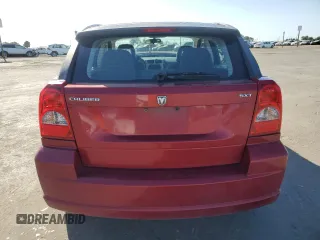 2007 Dodge Caliber SXT z VIN 1B3HB48B97D287353, wystawiony jako Copart lot #56952655 z przebiegiem 205 718 mil mil oraz Szkoda całkowita • Salvage title. Historia ofert i sprzedaży dostępna na DreamBid. Obrazek 6.