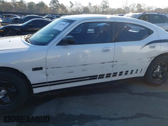 2010 Dodge Charger Police with VIN 2B3AA4CT5AH161604, listed as a IAAI auction lot 41814567 with 195,507 mi miles and . Bid and sale history available at DreamBid. Image 6.