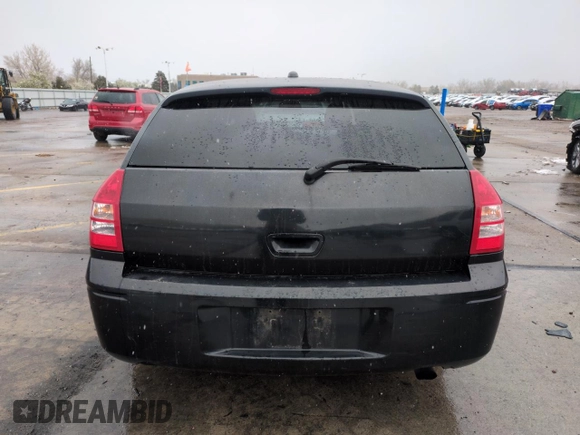 2005 Dodge Magnum SE z VIN 2D4FV48V55H529419, wystawiony jako Copart lot #53908645 z przebiegiem 176 793 mil mil oraz Szkoda całkowita • Salvage title. Historia ofert i sprzedaży dostępna na DreamBid. Obrazek 6.