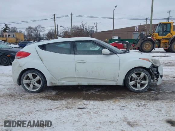 2013 Hyundai Veloster w/Black Int with VIN KMHTC6AD9DU171722, listed as a IAAI auction lot 41617721 with 115,791 mi miles and . Bid and sale history available at DreamBid. Image 13.