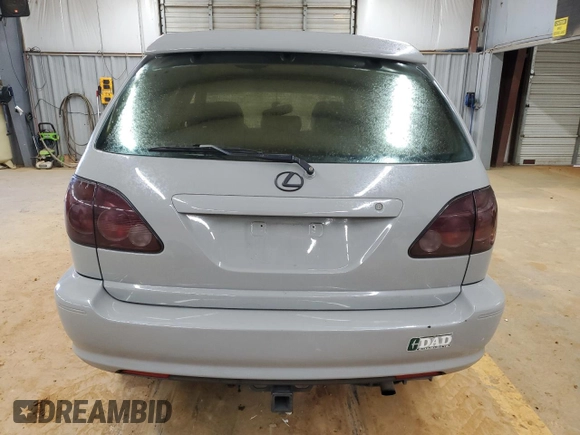 1999 Lexus RX 300 Luxury SUV with VIN JT6HF10U9X0016046, listed as a Copart auction lot 89170055 with 287,807 mi miles and Salvage Title. Bid and sale history available at carsss.com. Image 6.