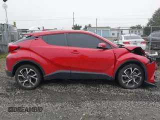 2021 Toyota C-HR LE with VIN JTNKHMBX1M1104530, listed as a IAAI auction lot 41324350 with 53,112 mi miles. Bid and sale history available at carsss.com. Image 13.