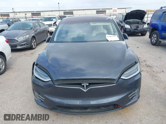 2018 Tesla Model X 75D with VIN 5YJXCDE21JF139712, listed as a IAAI auction lot 41905326 with Not Provided miles and . Bid and sale history available at carsss.com. Image 12.