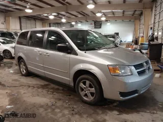 2010 Dodge Grand Caravan SE with VIN 2D4RN4DE3AR341120, listed as a IAAI auction lot 41617770 with 128,849 mi miles. Bid and sale history available at carsss.com. Image 1.