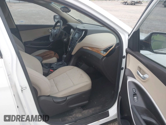 2016 Hyundai Santa Fe z VIN 5XYZU3LB0GG345673, wystawiony jako IAAI lot #42290297 z przebiegiem 75 701 mil mil oraz . Historia ofert i sprzedaży dostępna na DreamBid. Obrazek 5.