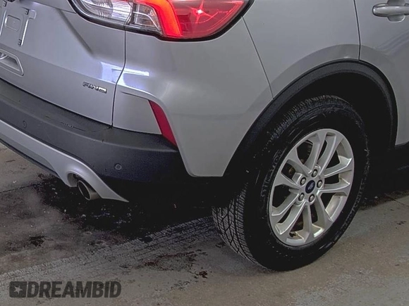 2022 Ford Escape SE with VIN 1FMCU9G60NUB32820, listed as a IAAI auction lot 42556181 with 39,771 mi miles and . Bid and sale history available at DreamBid. Image 4.
